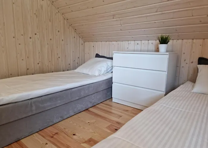 Деревянный коттедж Sloneczna Zatoka Gowidlino